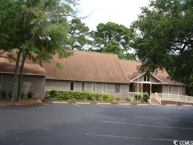 View of property featuring uncovered parking | Image 36