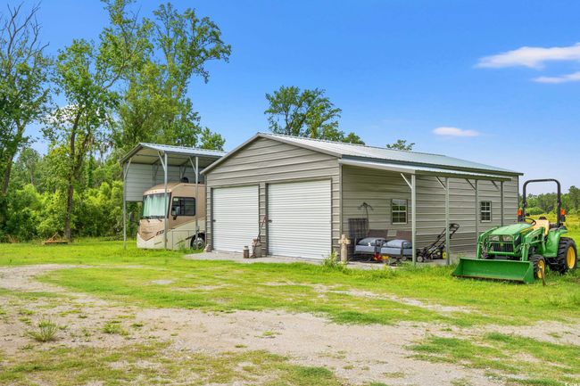 Garage with a detached garage | Image 28