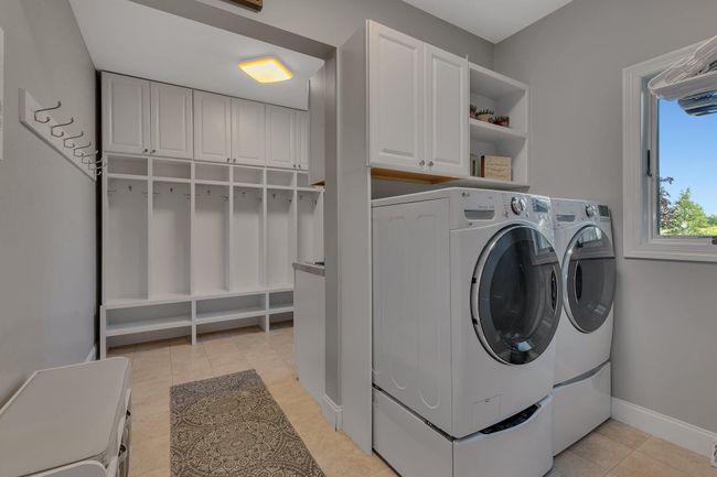 Main floor laundry and mud room | Image 34