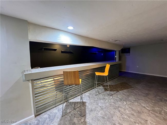 Bar featuring tile countertops | Image 18