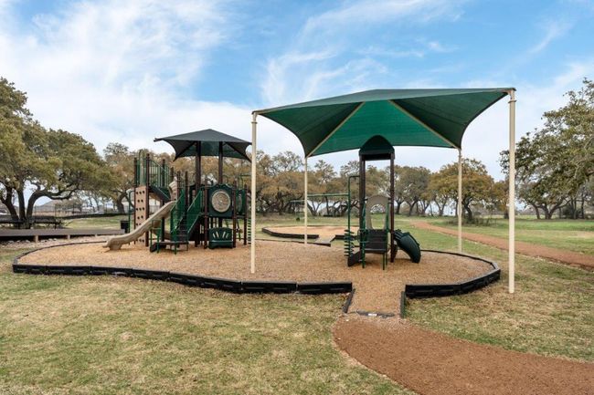 Community playground featuring a yard | Image 18