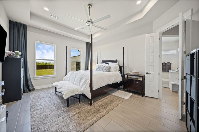 Huge Primary Bedroom with Tray ceilings. Upgraded ceiling fan. | Image 13