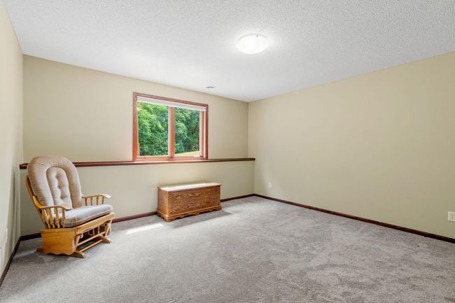 The fifth bedroom is large and private and also located in the lower level. | Image 34