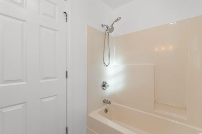 Unfurnished bedroom featuring carpet floors, baseboards, and a closet | Image 21