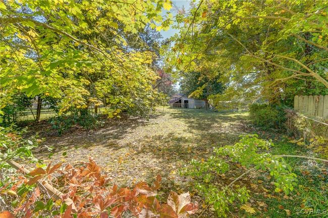View of yard featuring fence | Image 30