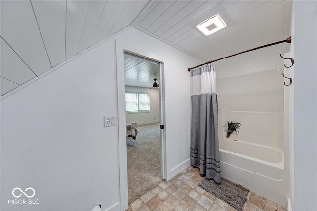 bedroom #4 full bath with lofted ceiling | Image 45