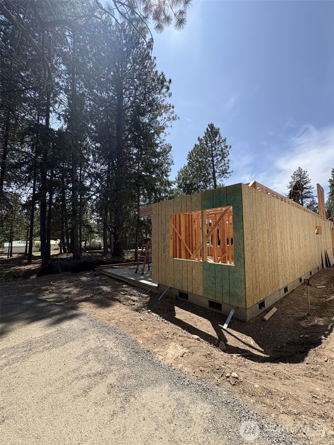 As the newest PNW master-planned community, enjoy 200+ acres of open space, trails & the Coal Trax Mt Bike Park. Soaring ceilings in the great roommake each day worthy of celebration & open floorplan appeals to entertaining. Covered deck & patio. Southern-facing homesites range from the mid600s- 900ks. Enjoy a variety of innovative & distinctive new home options with the best all-season recreation just moments away! Built for the future, indulge in a retreat just 90-min to Seattle. Plans and elevations are artist’s renderings only, may not accurately represent the actual condition of a home asconstructed and may also contain options and upgrades which are not included in the sale. Trailside Homes reserves the right to make changes to the floorplan, specifications, dimensions, design and elevations without prior notice. Stated dimensions and square footage are estimated and should not be usedas representations of the home’s actual size. | Image 8