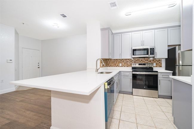 UNIT-102 - 6141 Metrowest Blvd, Condo with 4 bedrooms, 2 bathrooms and null parking in ORLANDO FL | Image 9