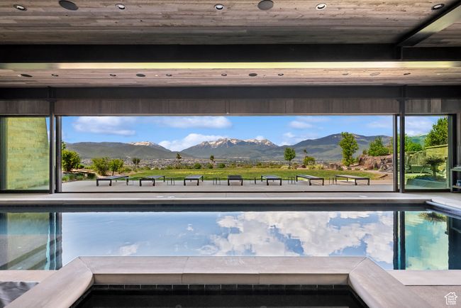 View of pool with a mountain view | Image 62