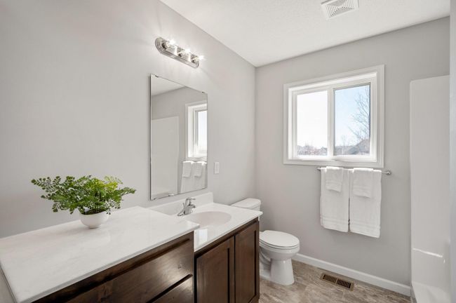 Primary bath w/dual sinks, raised counter & shower | Image 13