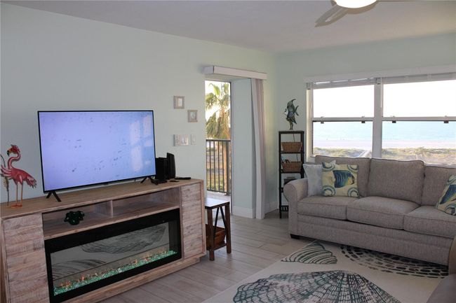 Living room with fireplace | Image 8
