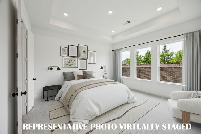 Located at the rear of the home for additional privacy, this owner's suite was designed for rest and relaxation. REPRESENTATIVE PHOTO VIRTUALLY STAGED | Image 9