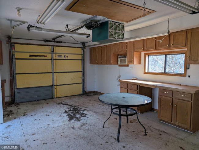 Inside additional garage | Image 54