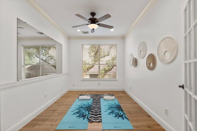 Additional main level room with glass french doors. Can be used for second office, living space and more | Image 6
