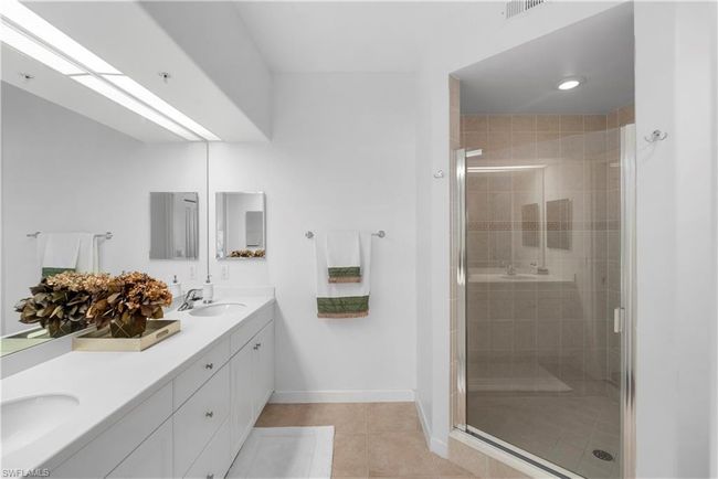 Bedroom featuring dark wood-style flooring and baseboards | Image 13