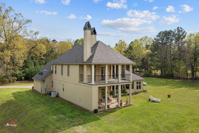 Multiple balconies provide numerous lake views. | Image 11
