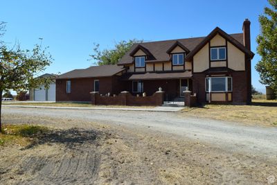 Tudor home featuring a garage | Image 2