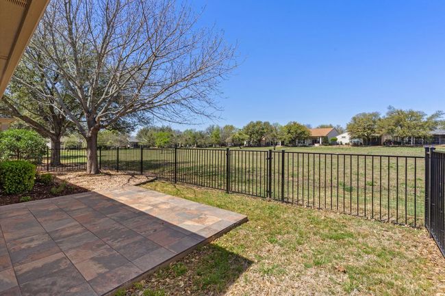 View of yard featuring a patio and fence | Image 36