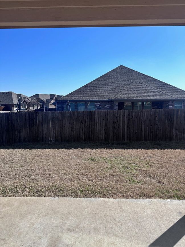 View of yard with fence | Image 26