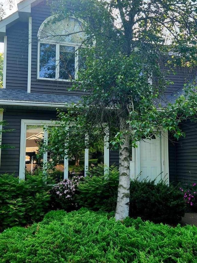 Surrounded by lush green landscaping | Image 29