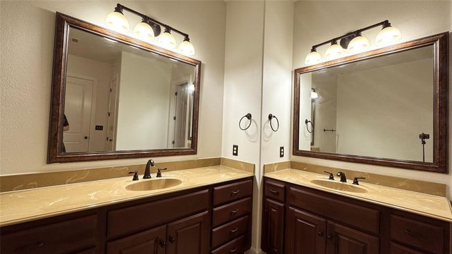 Full bath featuring two vanities | Image 7