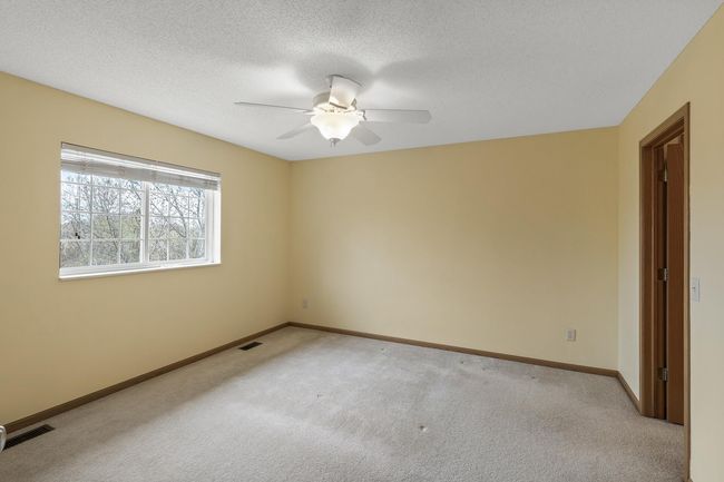 Spacious 13 x 13 primary bedroom. | Image 16