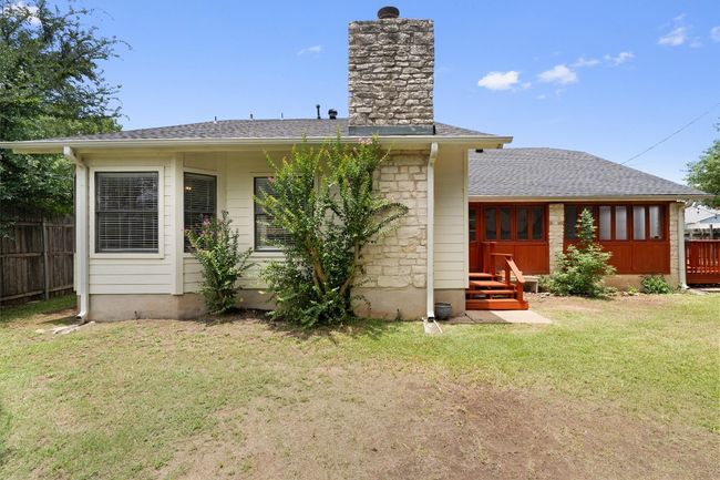 Back of property with a chimney and a shingled roof | Image 29