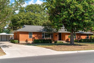 2nd view of front w shot up drive to carport | Image 2