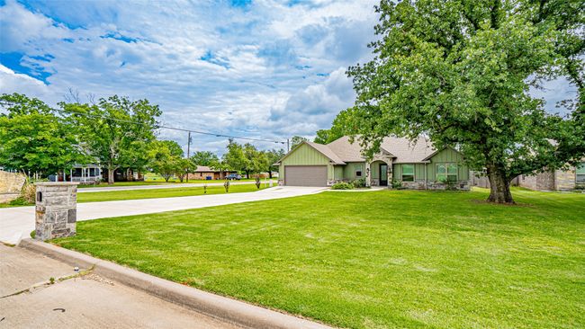 View of front of home featuring concrete driveway | Image 31