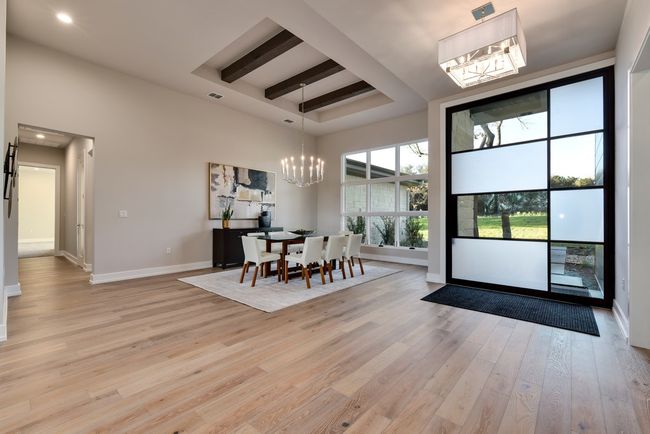 Dining area flanked by beautiful steel modern door | Image 20