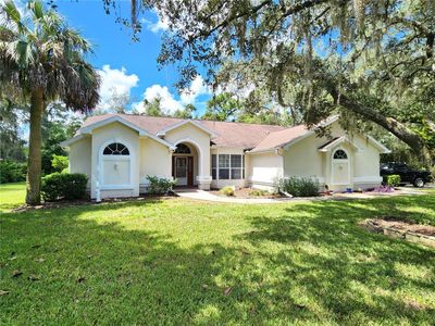 10464 Woodland Waters Boulevard, House other with 4 bedrooms, 2 bathrooms and null parking in Weeki Wachee FL | Image 1