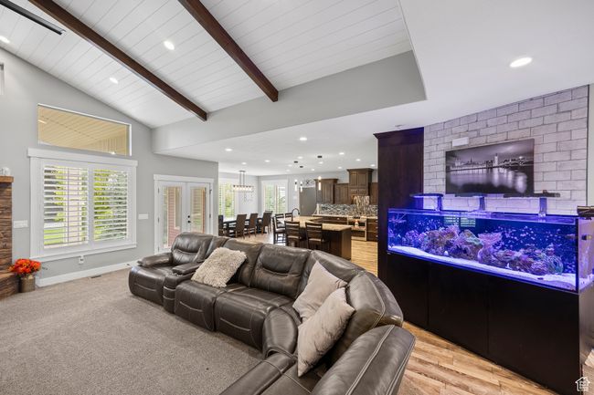 Living area with recessed lighting and baseboards | Image 17