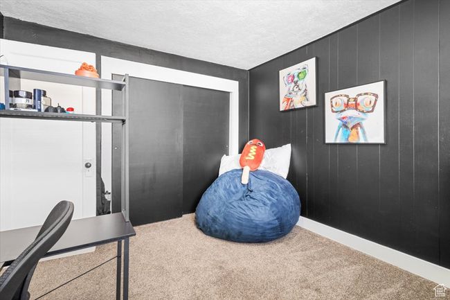 Interior space with baseboards, carpet floors, and a textured ceiling | Image 36