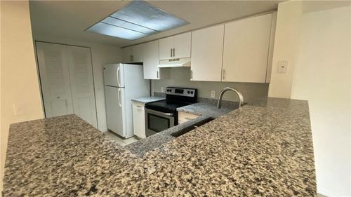 205-5045 Wiles Rd, Coconut Creek, FL, 33073-4210 | Card Image