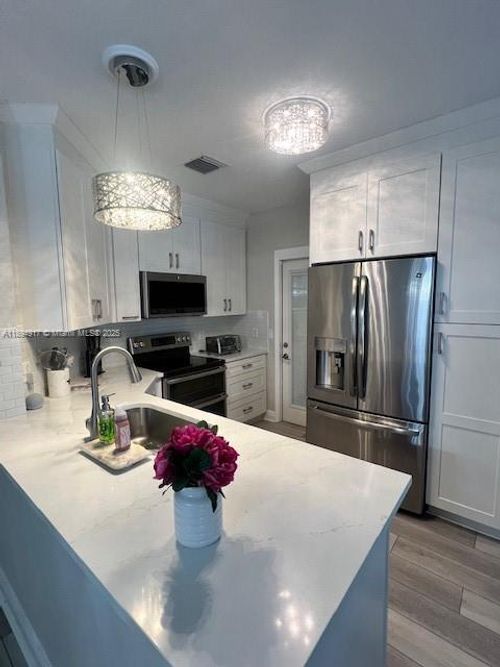 477-6010 Red Plum Ct, Tamarac, FL, 33321-6353 | Card Image