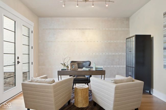 A dedicated home office located just off the foyer-ideal for remote work or personal projects. | Image 5