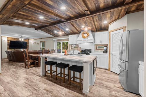 577 Winding River Rd S, Oakhurst, TX, 77359-1415 | Card Image