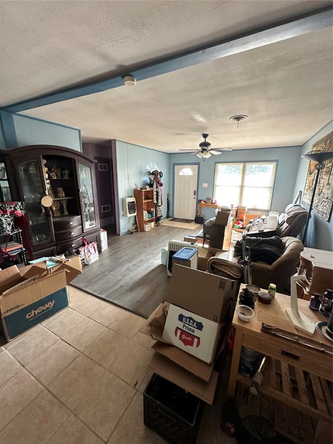 Front living room area/entryway and dining area | Image 15