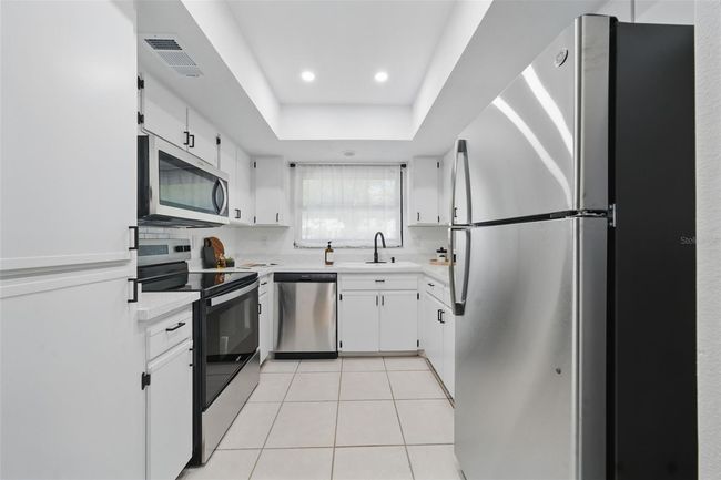 3004 Conifer Dr, Townhouse with 2 bedrooms, 2 bathrooms and null parking in LARGO FL | Image 8