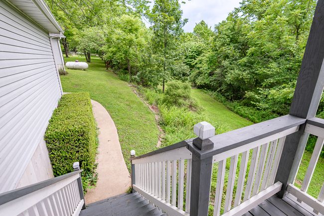 Deck Stairs to concrete walkway | Image 36