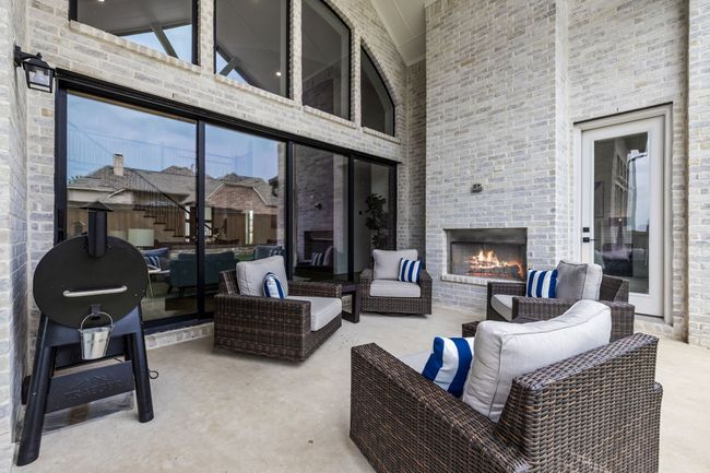 View of patio / terrace with an outdoor living space with a fireplace | Image 34