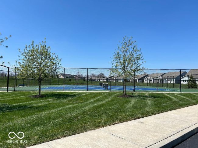 Tennis Court Pickle Ball courts are located on the opposite side of the clubhouse. | Image 37