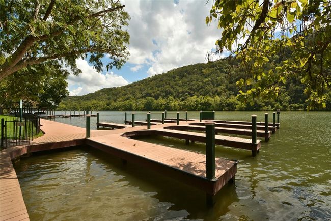 View of dock featuring a water view and a wooded view | Image 36