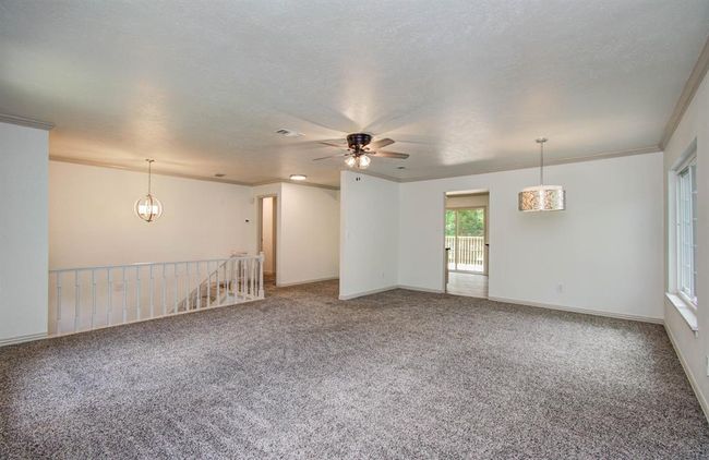 Expansive upstairs family room and room for dining area. | Image 12
