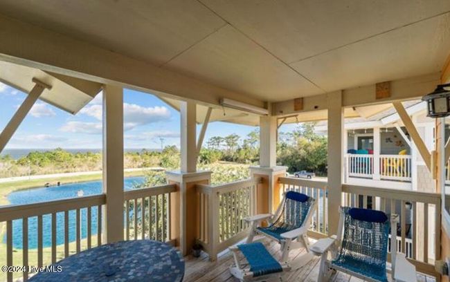 Pond & Sound Views From Covered Porch | Image 16