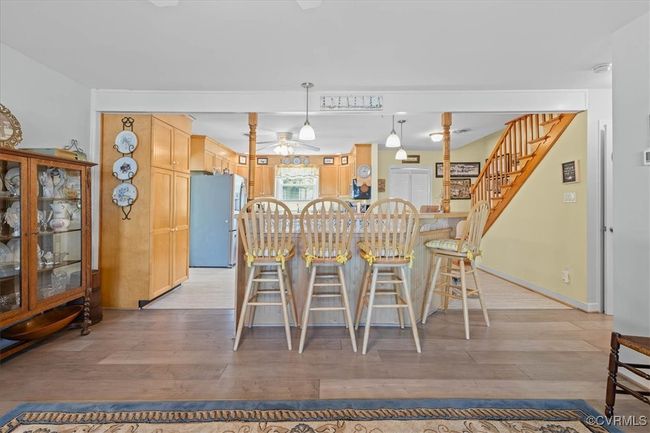 Looking into kitchen from formal dining room area - steps lead up to 2nd floor with 2 bedrooms and a full (shower) bath. | Image 8
