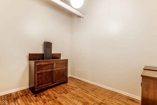 detailed view of wood finished floors and baseboards | Image 27