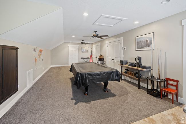Rec room featuring baseboards, recessed lighting, a ceiling fan, billiards table, and carpet floors | Image 60