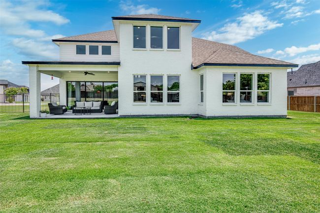 Beautiful home with large covered back patio. | Image 35