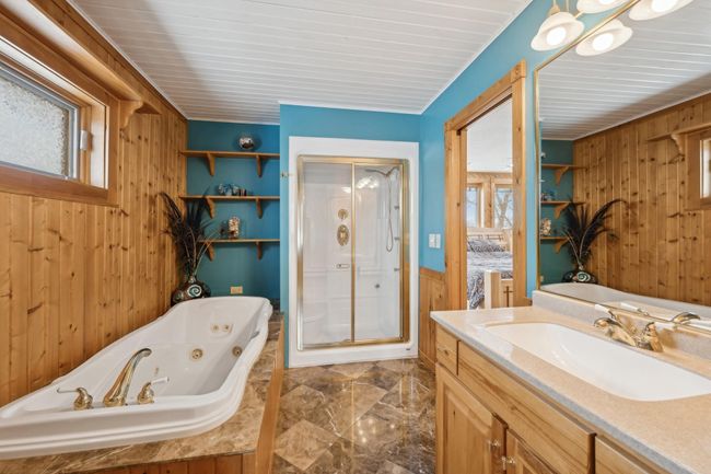 Upper level bathroom with steam shower and soaking tub! | Image 44